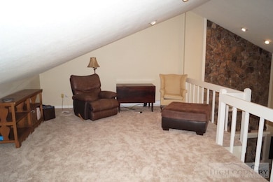 Loft: Lots of options here - extra sleeping area, reading nook, or play area. Loft overlooks living room.
