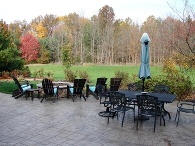 huge stamped patio with extra large fire pit