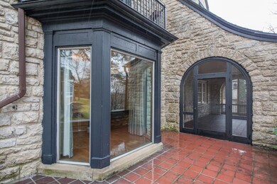 View of patio and screened porch
