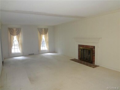 Living Room with Brick Fireplace
