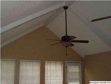 Great Room has two new ceiling fans and a vaulted 
