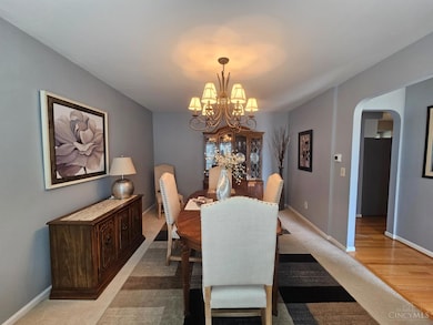 This room can be used as a living room or dining room.