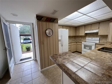 FOYER WITH KITCHEN TO THE LEFT OF FOYER