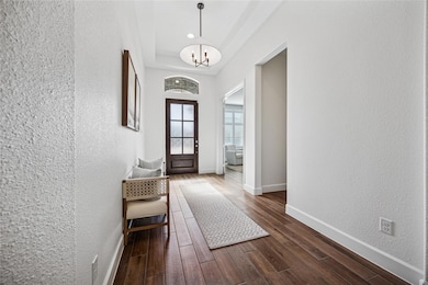 The foyer with 12 foot ceilings.