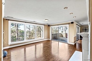 Spare room with dark hardwood / wood-style floors,