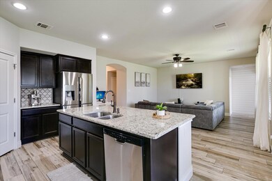 Kitchen featuring appliances with stainless steel