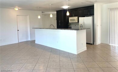 410 Broadmoor St, Lehigh Acres, FL 33974 - photo 4