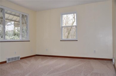 Living room with new carpeting (hardwood flooring 