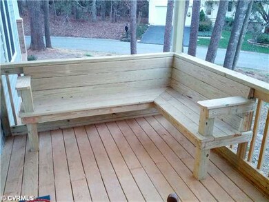 Exterior Front - Built in seating on screen porch