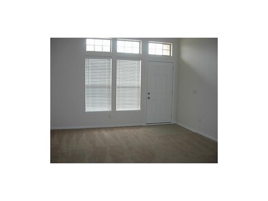 Living Room - Fresh paint and new carpet!