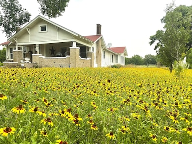 Rear view of property featuring a chimney, agricu