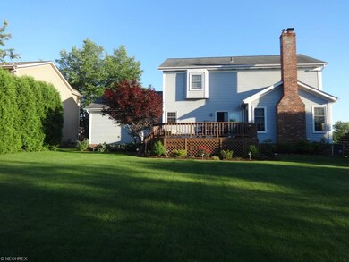 Backyard with wood deck - great for entertaining!