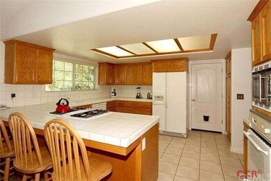 Kitchen with door to laundry room