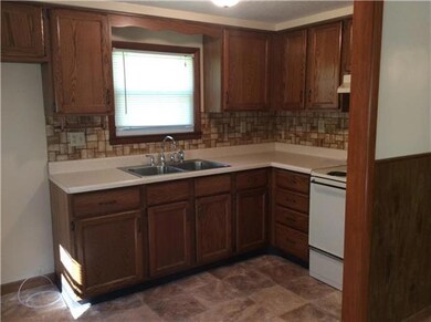 Kitchen isn't huge but has ample counter space.