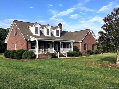 Front yard features 2 magnolia trees