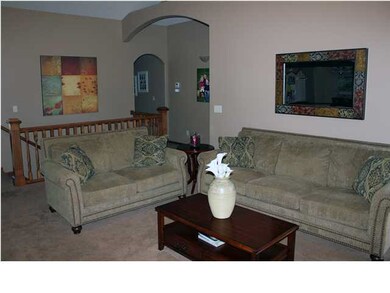 Large living room on main floor, rope lighting, di