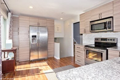 Tons of storage & breakfast bar seating. Kitchen a