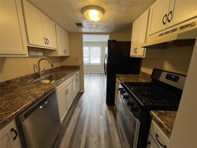 Kitchen with appliances with stainless steel finis