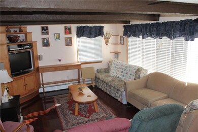 Living room with exposed beams