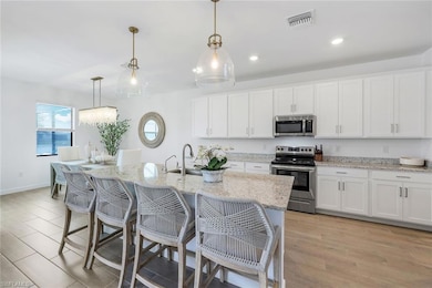 Kitchen featuring appliances with stainless steel 