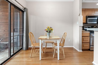 Dining space featuring light wood finished floors