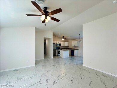 Unfurnished living room with lofted ceiling and ce