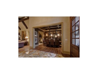 Grand entry with onyx tile flooring and dining roo