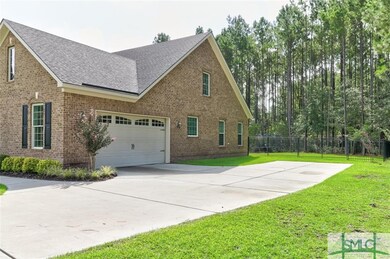 Double car garage entry on the side of the home