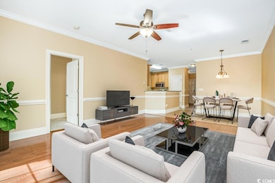 Living room featuring light wood-type flooring, ba