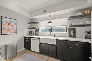 Kitchen features open shelving and Cafe appliances