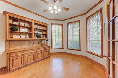 Traditional home office/study offering ample woodwork and lots of natural light