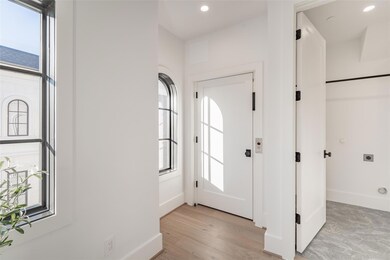 Foyer entrance featuring plenty of natural light a