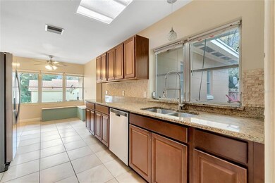 Kitchen with granite counters and stainless appliances 