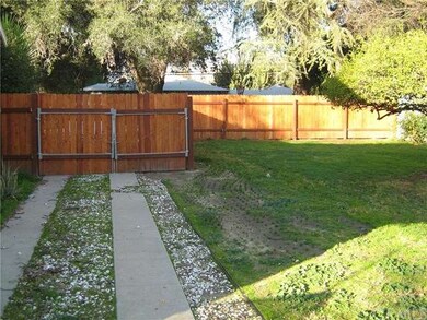 drive way entrance to back and double lot
