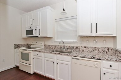Clean and functional kitchen with gorgeous granite