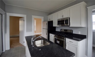 Kitchen view into bedrooms.
