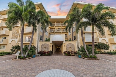 View of property at dusk