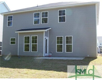 Exterior Back. View of back of home, large patio.