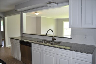 Kitchen, Breakfast Bar that opens into Family Room