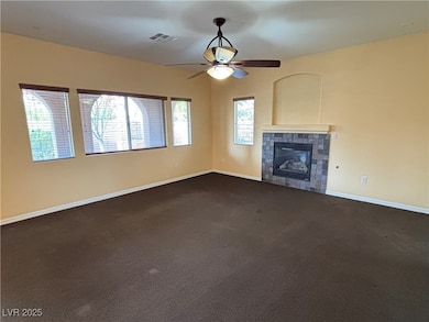 Unfurnished living room with baseboards, visible v