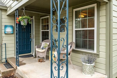 Charming covered front porch welcomes you home!