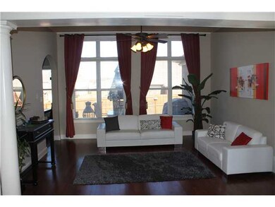 Exquisite Living Room with hardwood floors and col