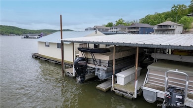 Last slip on left w/hoist included (boat is sold)