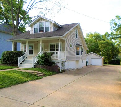 Long driveway for tons of parking! Detached oversized garage to fit your needs!