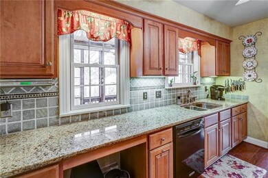 Another kitchen view.  Windows overlook screened in porch