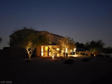 ANOTHER SILHOUETTE VIEW OF ESTATE HOME AT DUSK