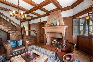 Parlor with handmade Terracotta fireplace and coffered ceilings