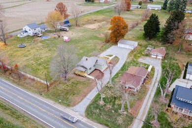 Overview of rural landscape featuring nearby suburban area