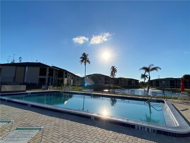Community pool featuring a patio area