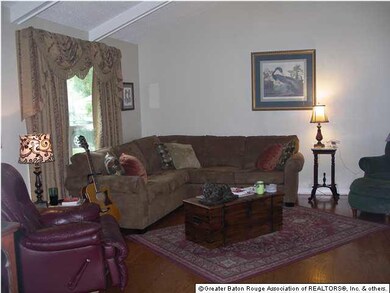 Living room with vaulted ceiling